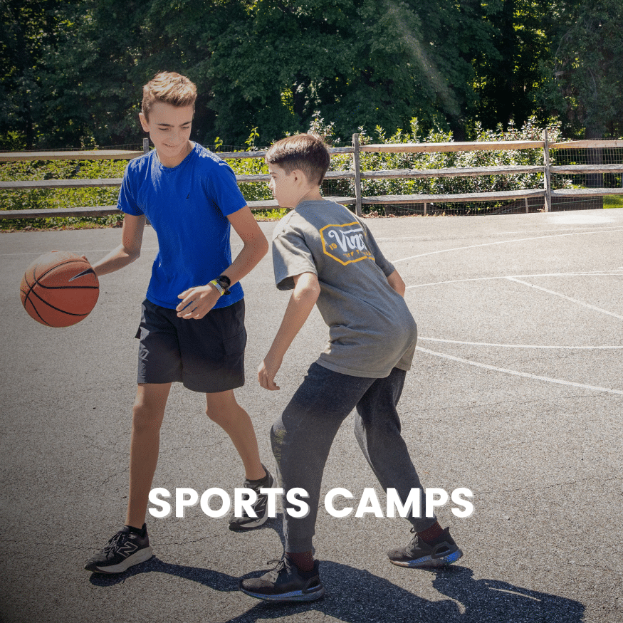 Two students play basketball together